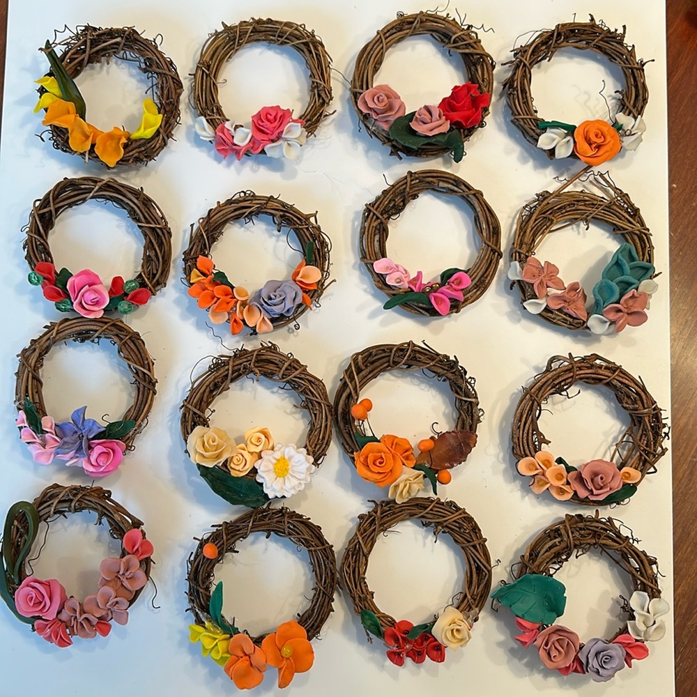 3” grapevine wreath decorated with handmade clay flowers